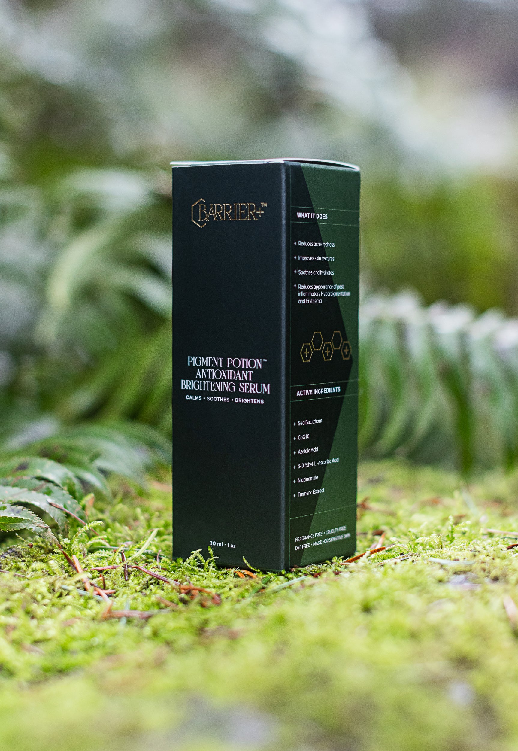 Barrier Plus Pigment Potion packaging on mossy green surface